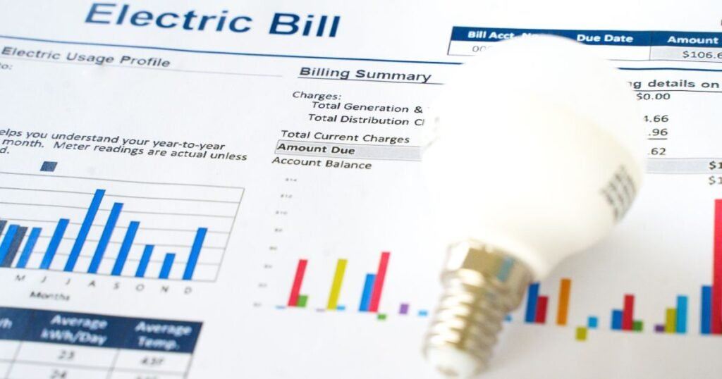 Electric bill statement with lightbulb on top